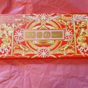 Pat McGrath Celestial Odyssey Palette with Red and Gold Hues